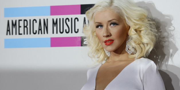 Musician Christina Aguilera arrives at the 41st American Music Awards in Los Angeles, California November 24, 2013. REUTERS/Mario Anzuoni (UNITED STATES - TAGS: ENTERTAINMENT)(AMA-ARRIVALS)