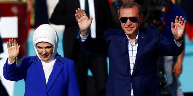 Turkish President Tayyip Erdogan, accompanied by his wife Emine Erdogan, greets supporters during a rally to mark the 563rd anniversary of the conquest of the city by Ottoman Turks, in Istanbul, Turkey, May 29, 2016. REUTERS/Murad Sezer
