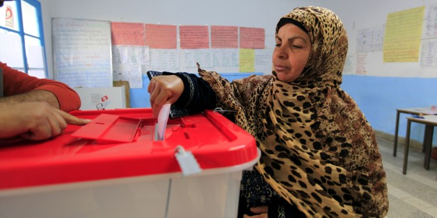 Archives. Une femme vote, lors du second tour de l'élection présidentielle de 2014.