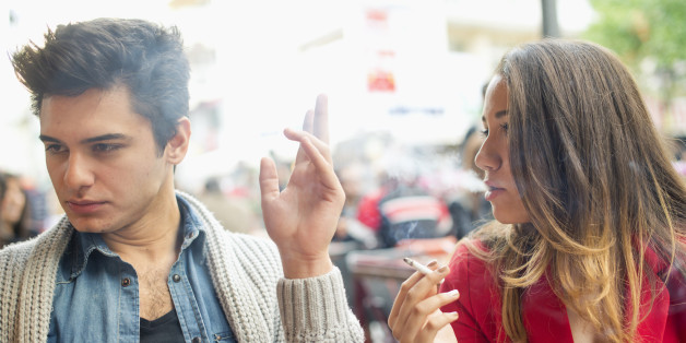 Nonsmoker Man and Smoker Young Woman
