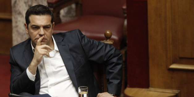 Greek Prime Minister Alexis Tsipras attends a parliamentary session, before a vote on a new package of tax hikes and reforms in Athens, Greece, May 22, 2016. REUTERS/Michalis Karagiannis