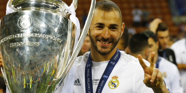 Soccer Football - Atletico Madrid v Real Madrid - UEFA Champions League Final - San Siro Stadium, Milan, Italy - 28/5/16Real Madrid's Karim Benzema celebrates with the trophy after winning the UEFA Champions LeagueReuters / Stefano RellandiniLivepicEDITORIAL USE ONLY.