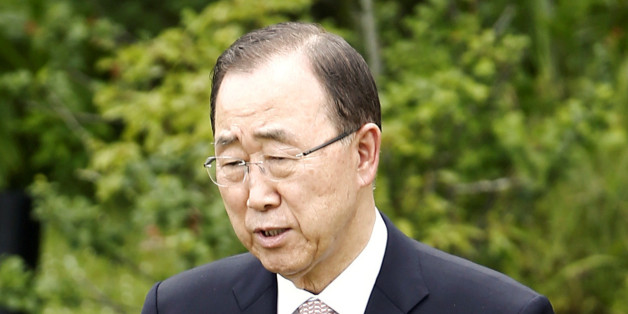 UN Secretary-General Ban Ki-moon (R) talks with French President Francois Hollande at the Ise-Shima G7 Summit in Shima, Japan, May 27, 2016. REUTERS/Jeon Heon-Kyun/Pool