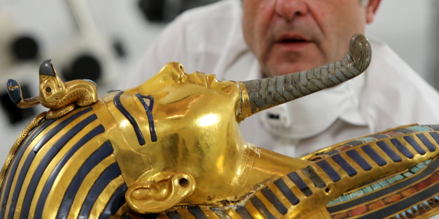 German conservator Christian Eckmann works on the restoration of the golden mask of King Tutankhamun at the Egyptian Museum in Cairo, Egypt, October 20, 2015. REUTERS/Mohamed Abd El Ghany TPX IMAGES OF THE DAY