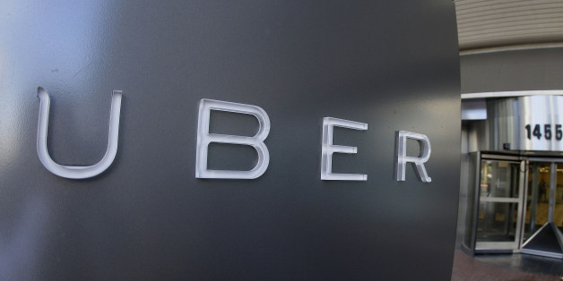 FILE - In this Dec. 16, 2015, file photo, a man leaves the headquarters of Uber in San Francisco. The killings in Kalamazoo, Michigan, raised anew a question that has dogged Uber and other taxi competitors. Their rides may be cheaper and more conveniently hailed than a cab, but the question is are they as safe. (AP Photo/Eric Risberg, File)