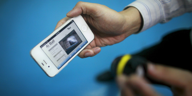 A Trek employee demonstrates the Ai Ball wifi video camera in Singapore December 19, 2012. Singapore's decade-long push to become a hotbed for entrepreneurs is stuck at stage one. Venture capital firms are put off by the small size of the market, lack of big ideas that can be a global success and an uncertain exit strategy. Only 50 out of 301 venture capital firms based in Singapore are interested in local investment, according to the Asian Venture Capital Journal Research. Of the 70 high tech start-ups the government has invested in over the past two years, just 10 received follow-on private funding from investors locally and abroad, according to the National Research Foundation, the government arm responsible for research and development. Picture taken December 19, 2012. REUTERS/Thomas White (SINGAPORE - Tags: MEDIA SCIENCE TECHNOLOGY BUSINESS TELECOMS)