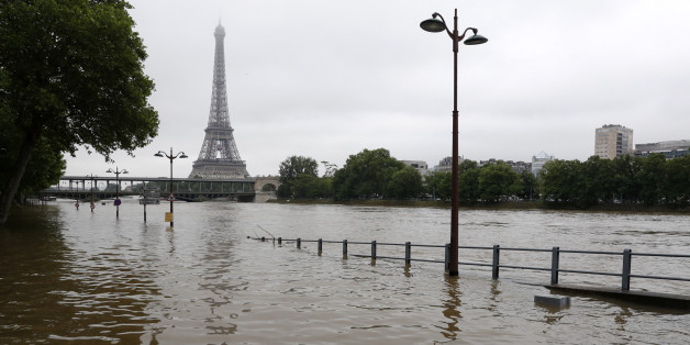 View of the flooded river-side of the River Seine near the Eiffel tower in Paris, France, after days of almost non-stop rain caused flooding in the country, June 3, 2016. REUTERS/Philippe Wojazer