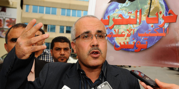 The spokesman of the new Tunisian Islamist Salafist Ettahrir Party (Liberation Party), Ridha Belhaj , gives a press conference on October 20, 2011 in Tunis. More than 40,000 police and soldiers will mobilise around Tunisia Sunday for the first Arab Spring elections, officials said as tensions built ahead of the historic vote. Roadblocks have already been stepped up and patrols were guarding some 7,000 polling stations countrywide with three days to go to Tunisia's first democratic elections after decades of strongman rule. AFP PHOTO / FETHI BELAID (Photo credit should read FETHI BELAID/AFP/Getty Images)