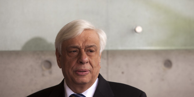Greek President Prokopis Pavlopoulos visits the Holocaust memorial Yad Vashem in Jerusalem, Wednesday, March 30, 2016. (AP Photo/Dan Balilty)