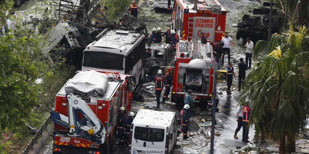 Fire engines stand beside a Turkish police bus which was targeted in a bomb attack in a central Istanbul district, Turkey, June 7, 2016. REUTERS/Osman Orsal
