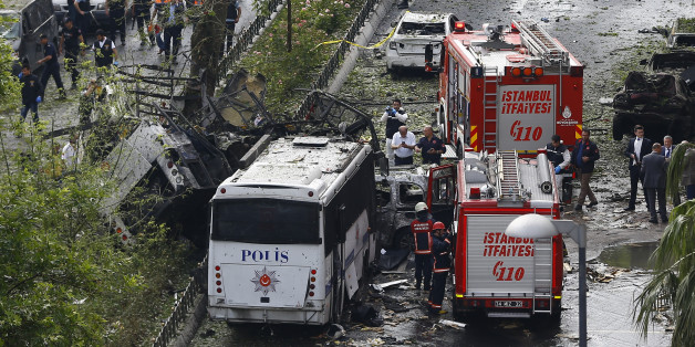 Fire engines stand beside a Turkish police bus which was targeted in a bomb attack in a central Istanbul district, Turkey, June 7, 2016. REUTERS/Osman Orsal