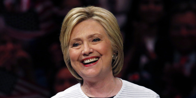 FILE - In this June 7, 2016 file photo, Democratic presidential candidate Hillary Clinton speaks in New York. Powered by a solid triumph in California, Clinton seizes her place in history as the first women to become a presumptive presidential nominee and sets out to unite a fractured party to confront Donald Trump. (AP Photo/Julio Cortez, File)