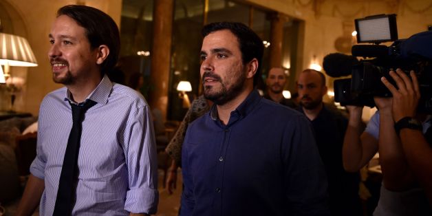 Leader of left wing party Podemos Pablo Iglesias (L) and leader of Izquierda Unida IU (United Left) Alberto Garzon arrive at the Ritz Hotel prior to an economic forum on June 6, 2016 in Madrid, four days ahead of the start of the electoral campaign.
Podemos, a close ally of Greece's ruling Syriza party, in May formed an alliance with Izquierda Unida, a coalition led by the countrys communist party, to run together in the June 26 elections. / AFP / GERARD JULIEN (Photo credit should read GERARD JULIEN/AFP/Getty Images)