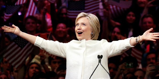 Democratic presidential candidate Hillary Clinton gestures as she greets supporters at a presidential primary election night rally, Tuesday, June 7, 2016, in New York. (AP Photo/Julio Cortez)