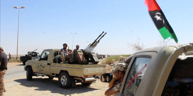 Forces aligned with Libya's new unity government are seen on the road as they advance on the eastern and southern outskirts of the Islamic State stronghold of Sirte, in this still image taken from video on June 9, 2016. via Reuters TV