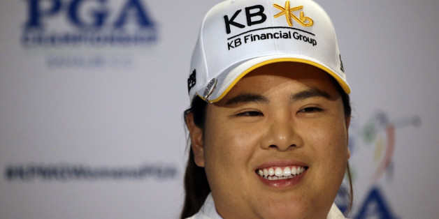 Inbee Park, of South Korea, begins to address a news conference after finishing the first round at the Women's PGA Championship golf tournament at Sahalee Country Club Thursday, June 9, 2016, in Sammamish, Wash. With the completed round, Park becomes eligible for the LPGA Hall of Fame. (AP Photo/Elaine Thompson)