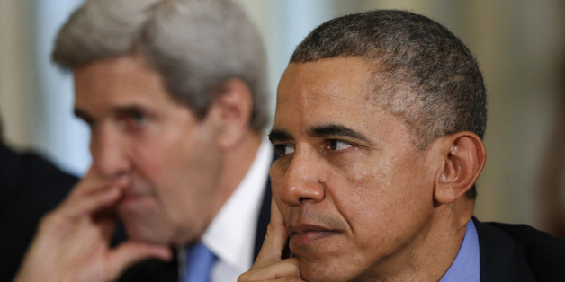 U.S. President Barack Obama and U.S. Secretary of State John Kerry (L) look on during a meeting with turkish President Recep Tayyip Erdogan at the World Climate Change Conference 2015 (COP21) in Paris, France December 1, 2015. REUTERS/Kevin Lamarque