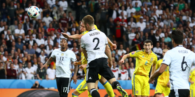 LILLE, FRANCE - JUNE 12: Shkodran Mustafi of Germany heads the ball to score his team's first goal during the UEFA EURO 2016 Group C match between Germany and Ukraine at Stade Pierre-Mauroy on June 12, 2016 in Lille, France. (Photo by Alexander Hassenstein/Getty Images)