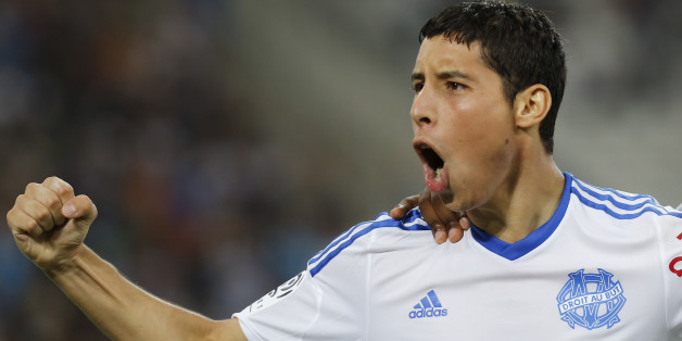 Olympique Marseille's Abdelaziz Barrada celebrates after his goal against Nice during their French Ligue 1 soccer match at the Velodrome Stadium in Marseille, August 29, 2014. REUTERS/Philippe Laurenson (FRANCE - Tags: SPORT SOCCER)
