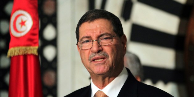 Tunisian Prime Minister Habib Essid speaks during a press conference after an attack carried out by two gunmen at Bardo International Museum on March 18, 2015 in Tunis. At least 17 foreigners were killed, they were among 19 people who died in the attack by two men armed with assault rifles on the museum, the interior ministry said. AFP PHOTO / ARBI SOUSSI (Photo credit should read ARBI SOUSSI/AFP/Getty Images)