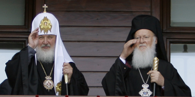 Newly elected Russian Orthodox Patriarch Kirill, left, and Istanbul Ecumenical Patriarch Bartholomew I gesture after they has led Sunday prayers in a show of unity at the patriarchal church of Aya Yorgi (St. George)in Istanbul, Turkey, Sunday, July 5, 2009. The churches in Istanbul and Moscow have been jostling for influence for years, but recently have pledged to overcome differences and achieve greater unity. Orthodox churches are largely autonomous, but the Istanbul-based Patriarchate is cons