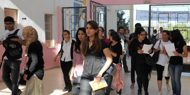 Tunisian students arrive to take the baccalaureat (high school graduation exam) exam on June 6, 2012 at a high school in Tunis. Some 129 181 candidates registered for the main session to be held baccalaureate this year from 6 to 13 June 2012. The average female candidates stood at 57.06% against 42% for boys. The Bachelor 2012 will be marked by the application of an adult aged 64 years and five students who are serving a prison sentence. The exam results will be announced on June 23, 2012. AFP P