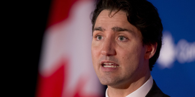 FILE - In this March 11, 2016 file photo, Canadian Prime Minister Justin Trudeau speaks at the Canada 2020 and the Center for American Progress luncheon gathering in Washington. Canada's new assisted suicide law to be announced on Thursday, April 14, 2016, will exclude non-Canadians, which means Americans won't be able to travel to Canada to die. The Supreme Court last year struck down laws that bar doctors from helping someone die, but put the ruling on hold while the government came up with a