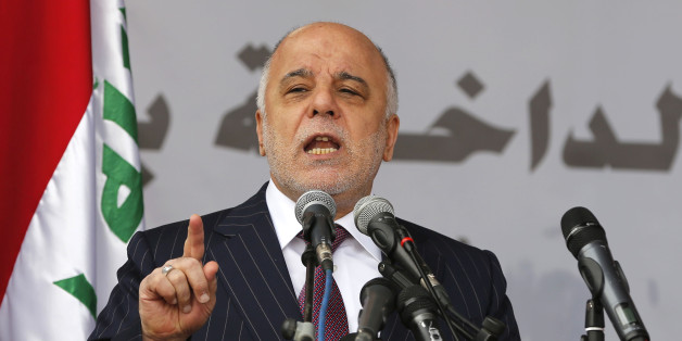FILE - In this Saturday, Jan. 9, 2016, file photo, Iraq's Prime Minister Haider al-Abadi, speaks during a ceremony marking Police Day at the police academy in Baghdad, Iraq. The Iraqi Prime Minister is dismissing plans to build a wall around the Iraqi capital, according to a statement released by his office Saturday night. The plan for the wall was originally drafted by the Interior Ministry as an effort to prevent Islamic State group attacks inside Baghdad. (AP Photo/Karim Kadim, File)