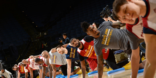 OAKLAND, CA - JUNE 18: The Cleveland Cavaliers stretch during practice and media availability as part of the 2016 NBA Finals on June 18, 2016 at ORACLE Arena in Oakland, California. NOTE TO USER: User expressly acknowledges and agrees that, by downloading and or using this photograph, User is consenting to the terms and conditions of the Getty Images License Agreement. Mandatory Copyright Notice: Copyright 2016 NBAE (Photo by Noah Graham/NBAE via Getty Images)