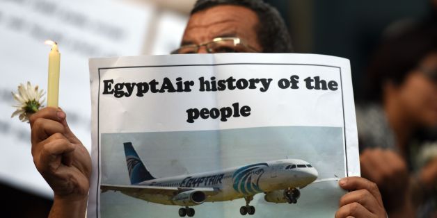 Egyptian journalists take part in a candle light vigil in memory of EgyptAir MS804 victims in front of the Journalists' Syndicate in Cairo on May 24, 2016.
The Airbus A320 carrying 66 people crashed into the sea while flying from Paris to Cairo early May 19, 2016, and some wreckage but not the black boxes has been found.
/ AFP / MOHAMED EL-SHAHED (Photo credit should read MOHAMED EL-SHAHED/AFP/Getty Images)