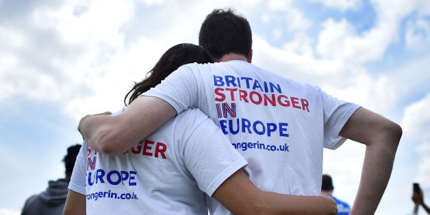 People wear 'Stronger-In' themed t-shirsts as they lsten to speakers at a rally for 'Britain Stronger in Europe', the official 'Remain' campaign group seeking to a avoid Brexit, ahead of the the forthcoming EU referendum, in Hyde Park in London on June 19, 2016.
The International Monetary Fund (IMF) warned last week that if Britain votes to exit the European Union on June 23, it could deal the economy a 'negative and substantial' blow. / AFP / BEN STANSALL (Photo credit should read BEN STANSALL/AFP/Getty Images)