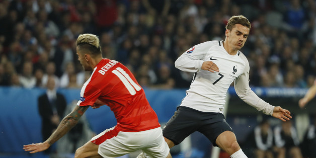Football Soccer - Switzerland v France - EURO 2016 - Group A - Stade Pierre-Mauroy, Lille, France - 19/6/16Switzerland's Valon Behrami challenges France's Antoine Griezmann resulting in the ball to burstREUTERS/Gonzalo FuentesLivepic