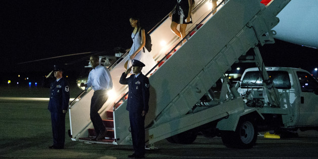 President Barack Obama, left, daughters Malia and Sasha and first lady Michelle Obama exit Air Force One on return to Washington at Andrews Air Force Base, Md., Sunday, June 19, 2016, after visiting the Yosemite National Park this weekend in celebration of the 100th anniversary of the creation of America's national park system. (AP Photo/Jacquelyn Martin)