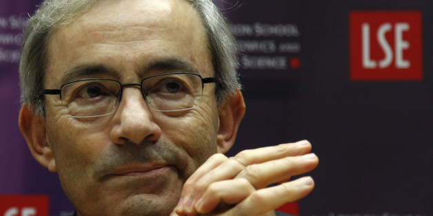 Nobel prize winner Christopher Pissarides gestures during a news conference in London October 11, 2010. Two Americans and a British-Cypriot won the 2010 economics Nobel for work which can explain how unemployment, job vacancies and wages are affected by regulation and policy, the prize committee said Monday. The Royal Swedish Academy of Sciences said the 10 million Swedish crown ($1.5 million) prize recognised Peter Diamond, Dale Mortensen and Christopher Pissarides "for their analysis of markets with search frictions". The economics prize, officially called the Sveriges Riksbank Prize in Economic Sciences in Memory of Alfred Nobel, was established in 1968. REUTERS/Stefan Wermuth (BRITAIN - Tags: SCI TECH SOCIETY)