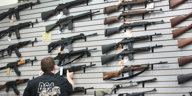 LAKE BARRINGTON, IL - JUNE 17: Guns built by DSA Inc and other manufacturers are displayed inside the DSA Inc. store on June 17, 2016 in Lake Barrington, Illinois. Earlier in the day the facility was the target of an anti gun protest. DSA Inc. manufactures FAL, AR-15 and RPD rifles. (Photo by Scott Olson/Getty Images)