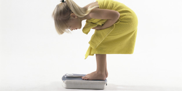 Girl standing on scale