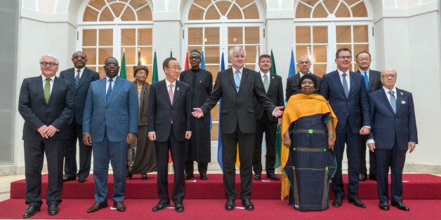 Bavaria's State Premier Horst Seehofer (C) poses with German Foreign Minister Frank-Walter Steinmeier (L), Ethiopia's Prime Minister Hailemariam Desalegn (2nd L), Senegal's President Macky Sall (3rd L) Liberia's President Ellen Johnson Sirleaf (4th L), the Secretary-General of the United Nations Ban Ki-moon (5th L), Nigerian President Muhammadu Buhari (6th L), South African politician and anti-apartheid activist Nkosazana Dlamini-Zuma (4th R, front), the Secretary-General of the Organisation for Economic Co-operation and Development Angel Gurria (4th R, row behind), German Minister of Economic Cooperation and Development Gerd Mueller (3rd R) and Tunisian President Mohamed Beji Caid Essebsi (R) for a family picture during a reception on the sidelines of a G7-summit in Munich, southern Germany, on June 7, 2015. AFP PHOTO / DPA / ARMIN WEIGEL +++ GERMANY OUT (Photo credit should read ARMIN WEIGEL/AFP/Getty Images)