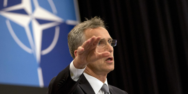 NATO Secretary General Jens Stoltenberg speaks during a media conference at NATO headquarters in Brussels on Monday, June 13, 2016. NATOâs chief says the alliance will agree this week to send four multinational battalions to the Baltic states and Poland to boost their defenses against Russia. (AP Photo/Virginia Mayo)