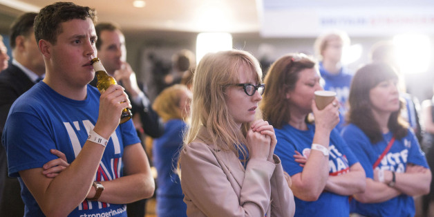 Supporters of the Stronger In campaign react after hearing results in the EU referendum at London's Royal Festival Hall, Friday, June 24, 2016. On Thursday, Britain voted in a national referendum on whether to stay inside the EU. On Thursday, Britain voted in a national referendum on whether to stay inside the EU. (Rob Stothard/Pool via AP)