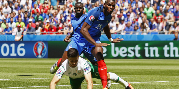 Football Soccer - France v Republic of Ireland - EURO 2016 - Round of 16 - Stade de Lyon, Lyon, France - 26/6/16France's Paul Pogba fouls Republic of Ireland's Shane Long for a penalty that Robbie Brady later scoresREUTERS/Jason CairnduffLivepic