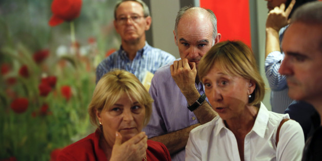 People wait for election results at Spain's Socialist Party (PSOE) headquarters after polling stations closed in Spain's general election in Madrid, Spain, June 26, 2016. REUTERS/Susana Vera