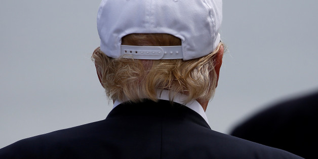 Republican presidential candidate Donald Trump speaks to the media on the golf course at his Trump International Golf Links in Aberdeen, Scotland, June 25, 2016. REUTERS/Carlo Allegri