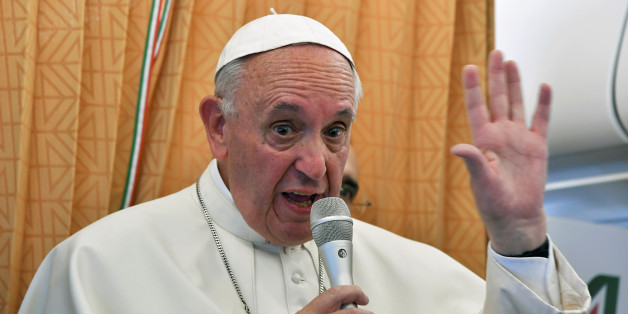 Pope Francis speaks to journalists on his flight back to Rome following a visit at Armenia on June 26, 2016. REUTERS/Tiziana Fabi/Pool TPX IMAGES OF THE DAY