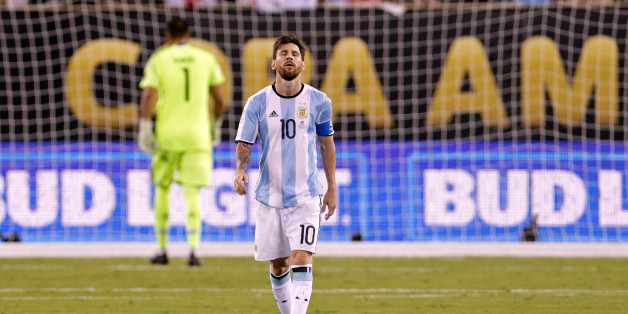 Jun 26, 2016; East Rutherford, NJ, USA; Argentina midfielder Lionel Messi (10) reacts after missing a shot during the shoot out round against Chile in the championship match of the 2016 Copa America Centenario soccer tournament at MetLife Stadium. Chile won. Mandatory Credit: Adam Hunger-USA TODAY Sports