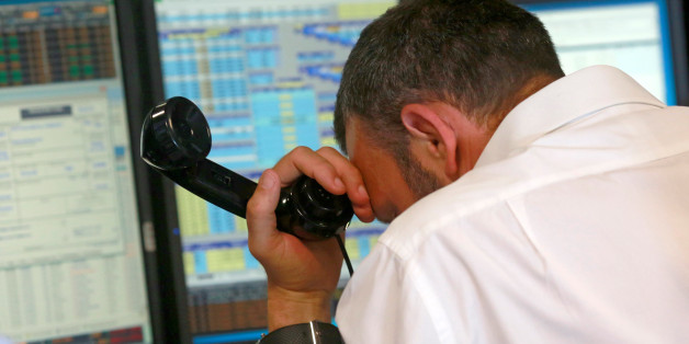 A trader from BGC, a global brokerage company in London's Canary Wharf financial centre reacts during trading June 24, 2016 after Britain voted to leave the European Union in the EU BREXIT referendum. REUTERS/Russell Boyce