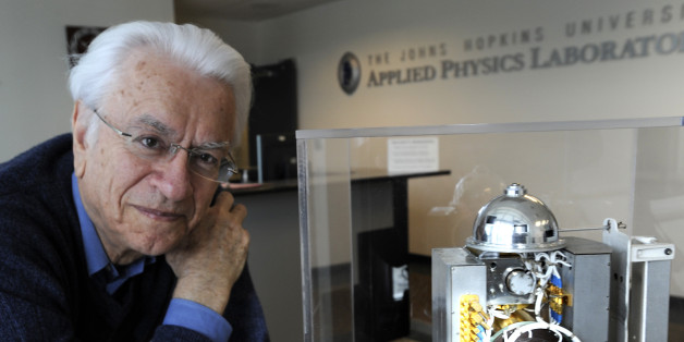 Stamatios M. Krimigis, of the Johns Hopkins University Applied Physics Laboratory, is pictured with the Voyager spacecraft's backup flight unit, which was never used, January 10, 2011, in Laurel, Maryland. (Jed Kirschbaum/Baltimore Sun/MCT via Getty Images)