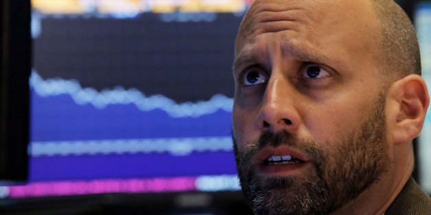 A specialist trader works at his post on the floor of the New York Stock Exchange (NYSE) in New York City, U.S., June 27, 2016. REUTERS/Brendan McDermid