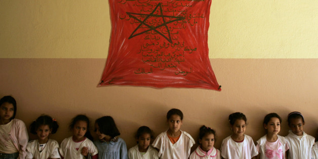 Children await the arrivals of Jordan's Queen Rania and Morocco's Princess Lalla Salma at the Fkih Tahiri Primary School in Fes June 1, 2007. Queen Rania is in Morocco to attend the opening of the 13th Annual Fez Festival of World Sacred Music. REUTERS/Rafael Marchante (MOROCCO)