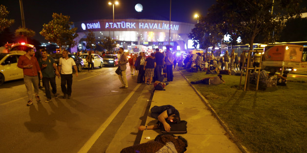 People leave Turkey's largest airport, Istanbul Ataturk, Turkey, following a blast June 28, 2016. REUTERS/Osman Orsal