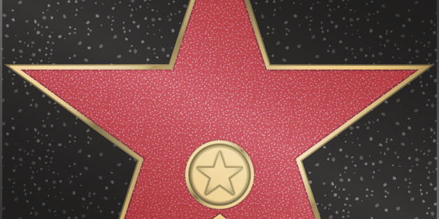 Red marble star with a metal loop and logo